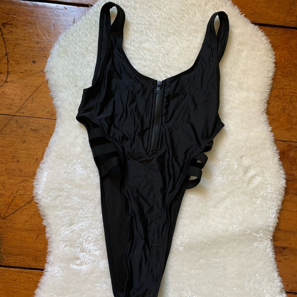 Black one piece swimsuit.
